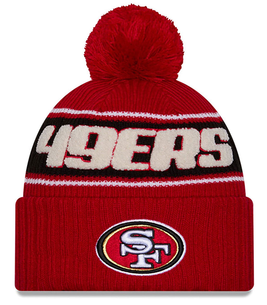 San Francisco 49ers New Era 2024 NFL Sideline Red Cuffed Pom Knit Hat product image 1, provided for visual reference and