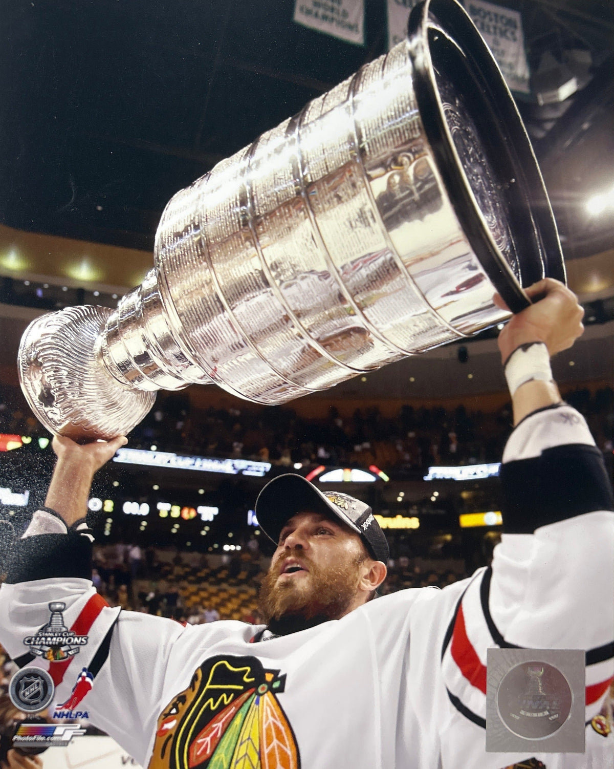 Viktor Stålberg Holding Stanley Cup Chicago Blackhawks Action Photo (8X10) product image 1, provided for visual reference
